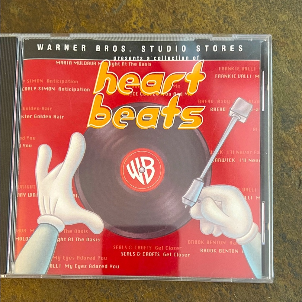 Warner Bros Heart Beats CD-EUC *like new*